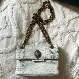 White and gray snake clutch or shoulder bag.